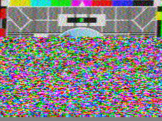 Colorful TV test image at the top, colorful noise at the bottom.